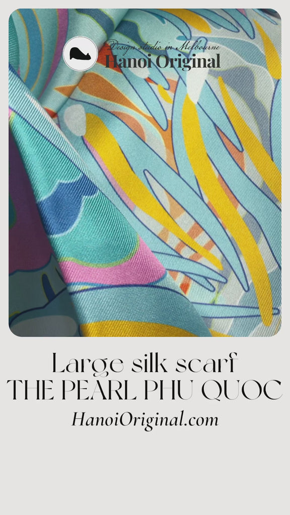 A video showing close up to the Silk Twill Large scarf The Pearl Phu Quoc by Hanoi Original Studio 